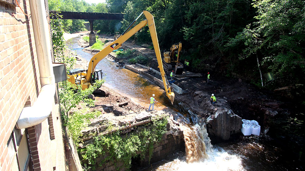 Excavator working in the river