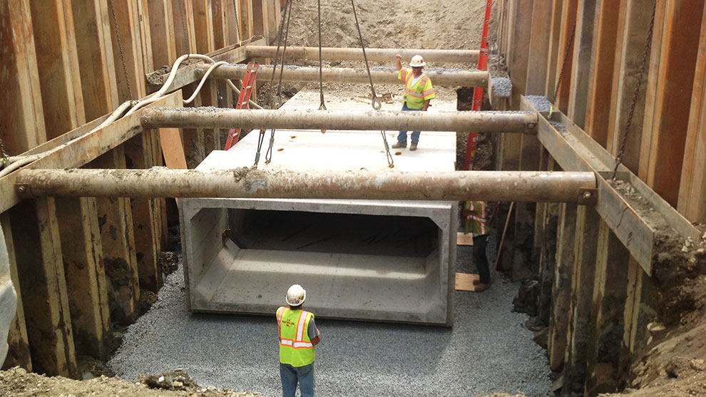 putting culvert into place