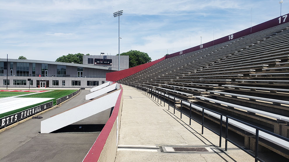 Interior view of McGuirk stadium with bleachers and walkway