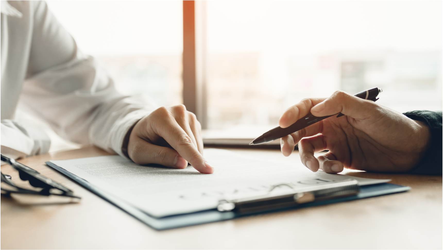 Power or Policy Blog Image, two people working at conference table